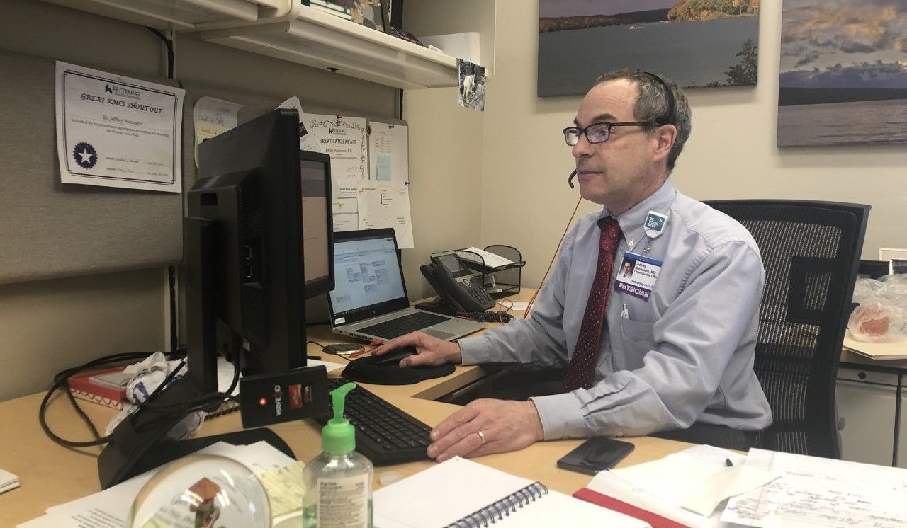Dr. Jeffrey Weinstein at his desk